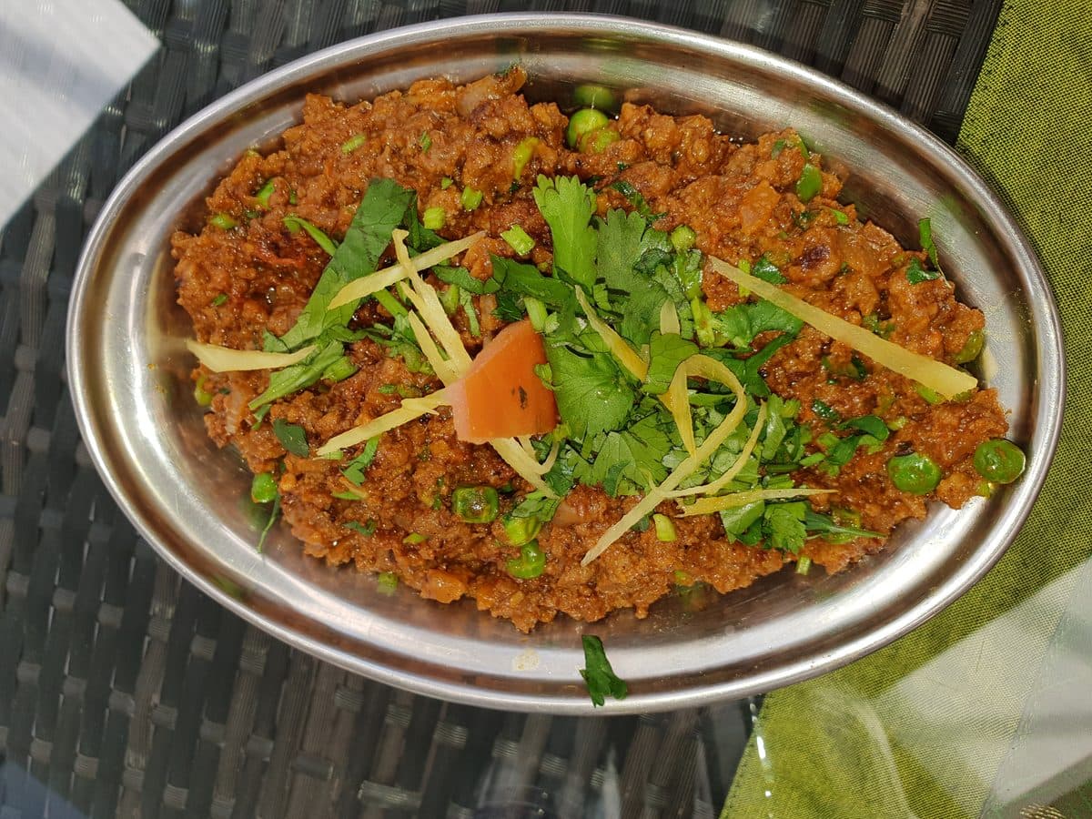 Qeema Calories: Per Plate, Per 100g & Chicken vs Beef vs Mutton — CalsFlow guide cover